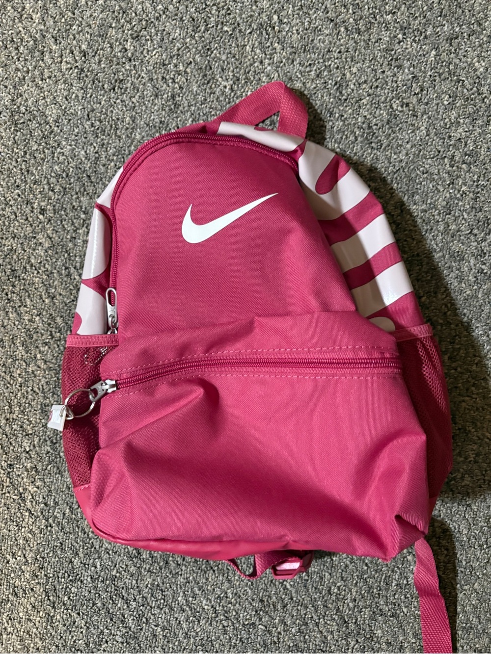 Nike Hot Pink Women’s Backpack with White Swoosh and Striped Accents